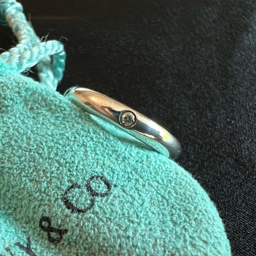 Tiffany & Co. Silver Band Ring with Single Diamond